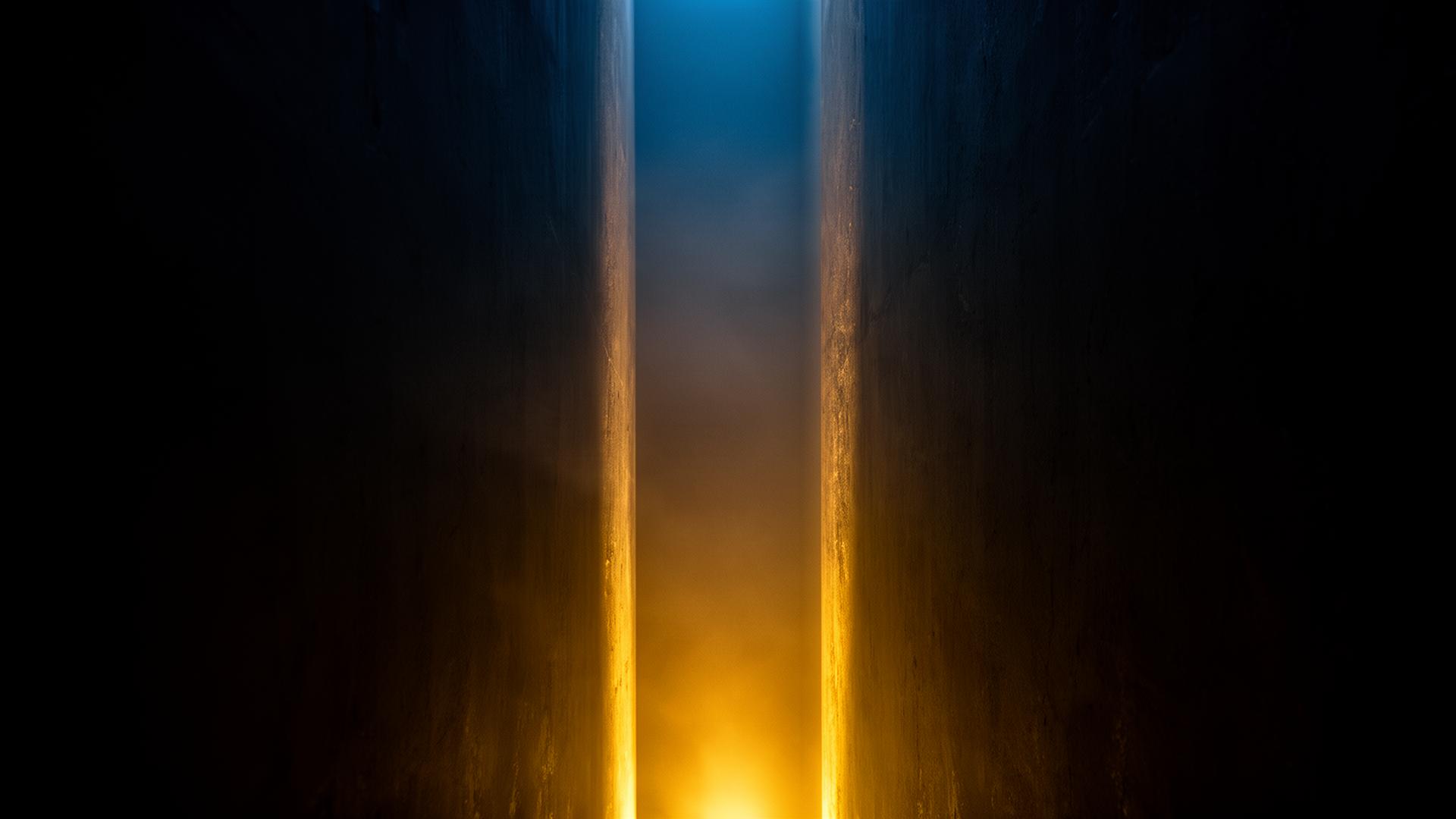 Golden light flowing through a channel between darkness
